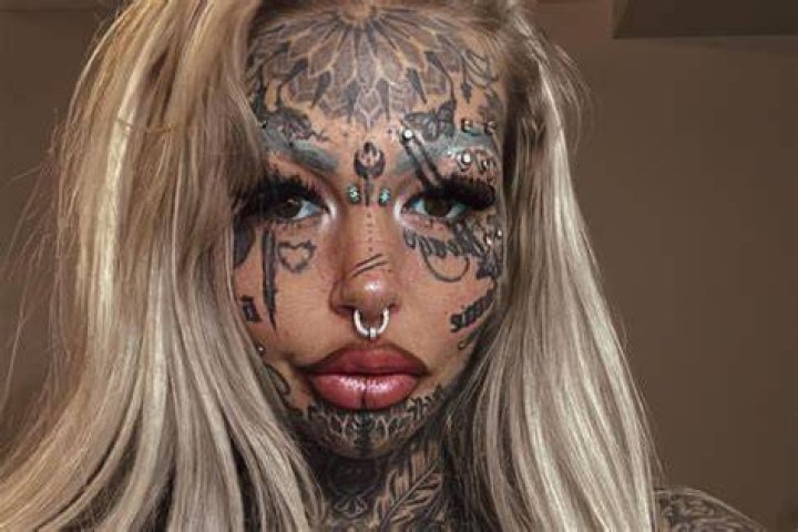 'Dragon Girl', spent $39K modifying body, blind after inking eyeballs
