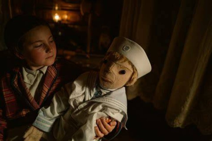 A curse holds a child as a shield