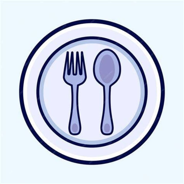 a fork in a plate of food