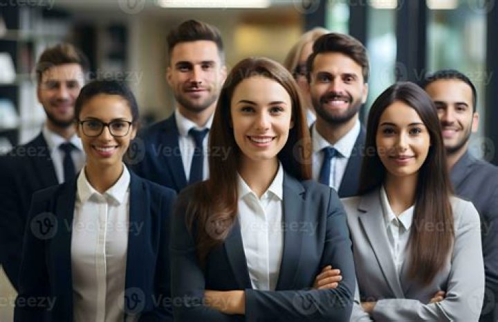A group photo of a smiling family on Wife Swap