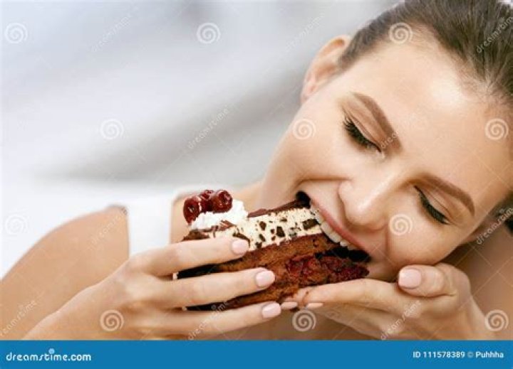 a person eating a dessert