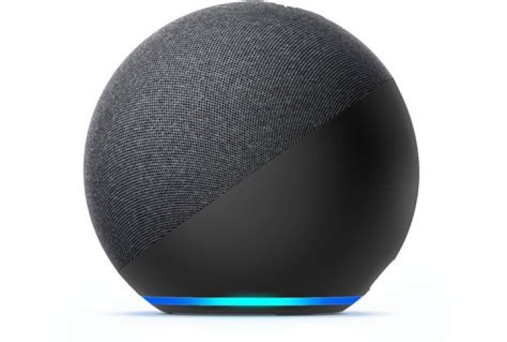 Amazon Echo 4th Generation with Echo Dot 3rd Generation on a colorful background