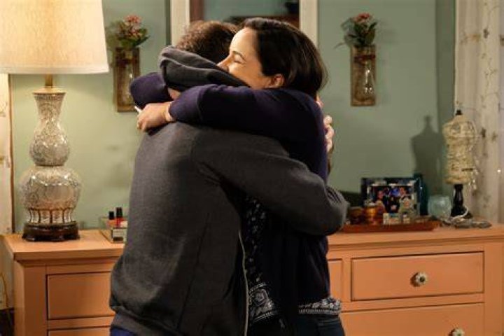 Amy and Jake look at Det. Dave Majors