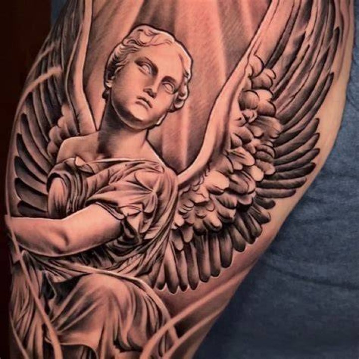 An Angel statue tattoo