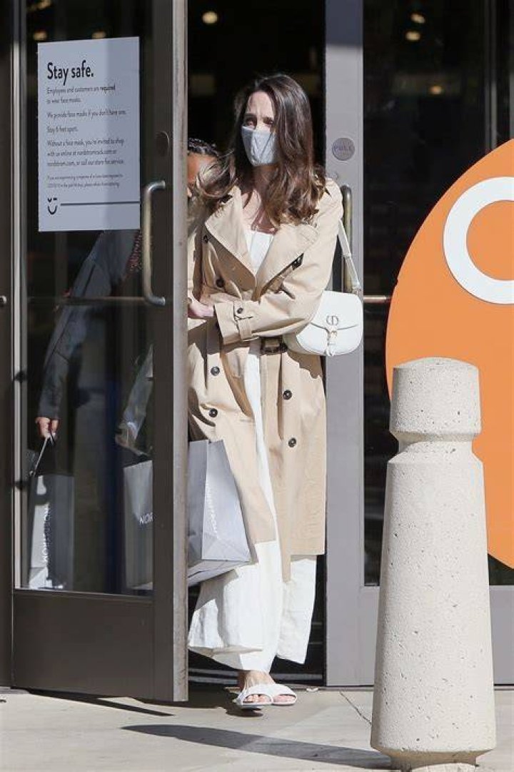 Angelina Jolie Stuns in a Flowing White Dress to Shop with Zahara