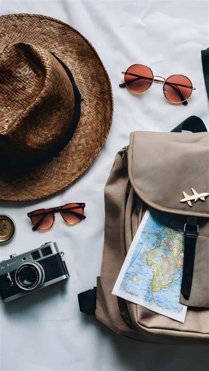 Backpack, hat, camera, sunglasses