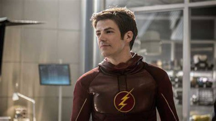 Barry Allen from The Flash with falling hundred dollar bills.