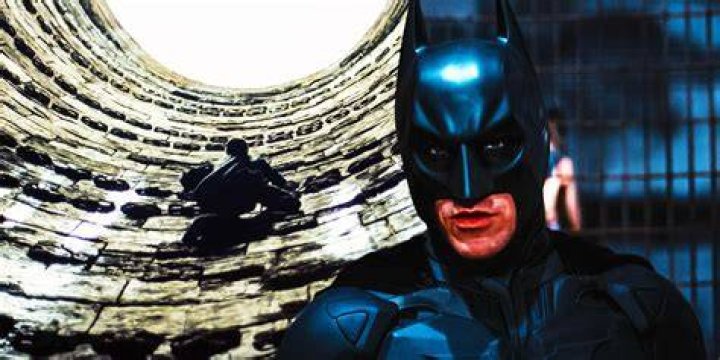 Batman climbing up The Pit in The Dark Knight Rises