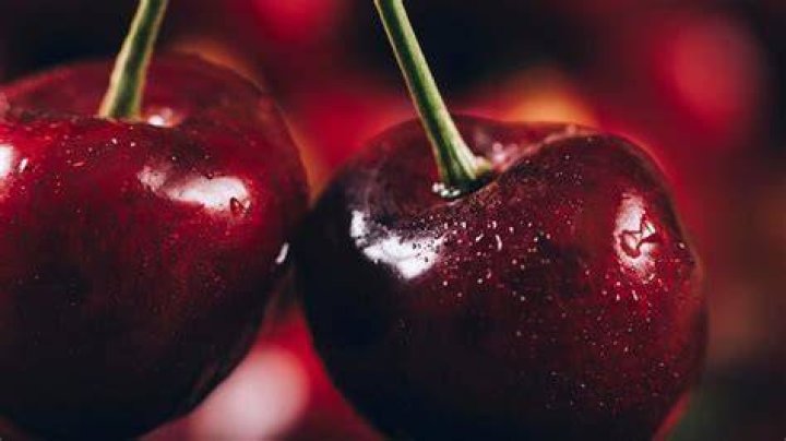 benefits of cherries close up of cherries in a pile