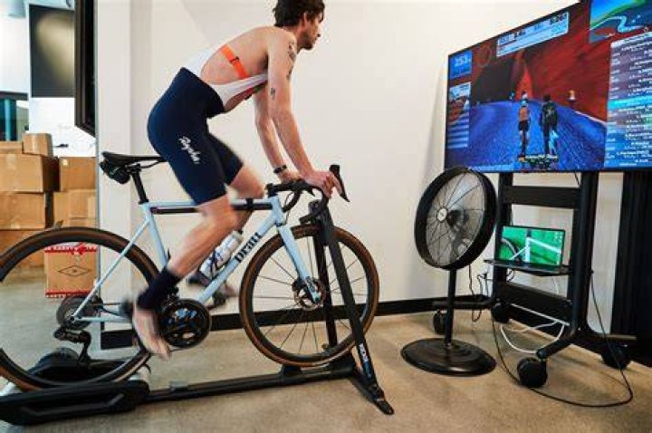 assault bike bicycle, bicycle wheel, bicycle trainer, vehicle, bicycle accessory, bicycle part, cycling, bicycle frame, sports equipment, bicycle tire,