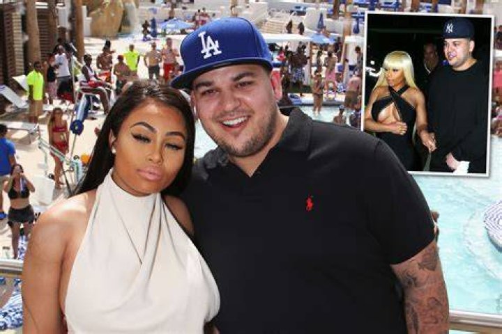 Blac Chyna poses in bed with one of the men Rob Kardashian accused her of cheating with