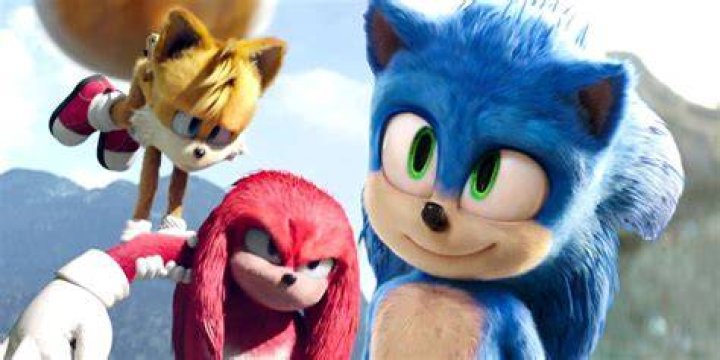 Blended image of Tails holding Knuckles and Sonic smiling in Sonic the Hedgehog 2