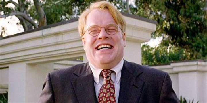 Brandt smiling in The Big Lebowski