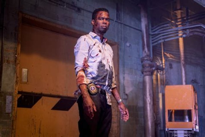 Chris Rock as Ezekiel "Zeke" Banks in Spiral: From the Book of Saw