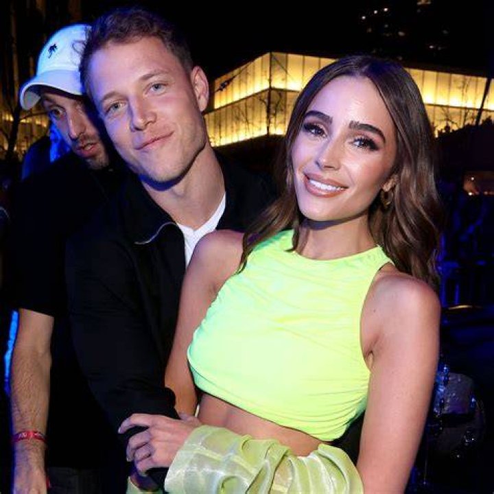 Christian McCaffrey’s On-Field PDA With Fiance Olivia Cuplo Gets the Attention
of Stephen Curry