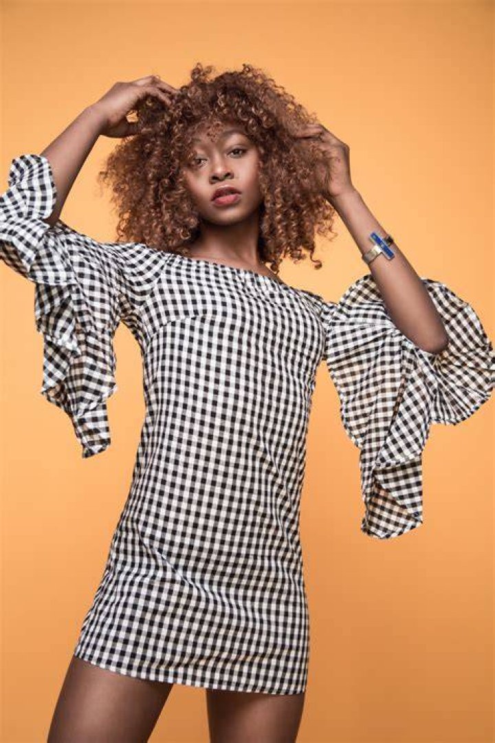 Clothing, Hairstyle, Shoulder, Flooring, Joint, Dress, Red, Style, Carpet, Waist, 