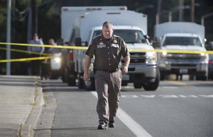 Coroner identifies 3 slain inside trailer near Lacey