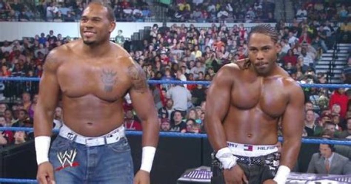 Cryme Tyme arms raised