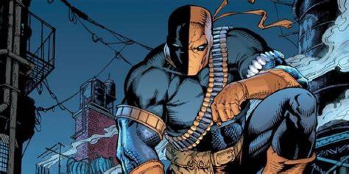 Deathstroke sitting on a rooftop.