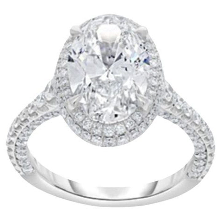 Diamond, Ring, Platinum, Body jewelry, Fashion accessory, Jewellery, Gemstone, Pre-engagement ring, Engagement ring, Metal, 
