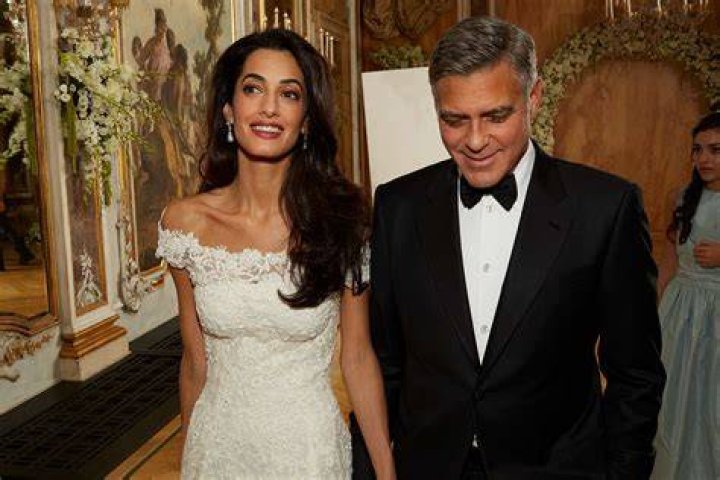 Did Amal Clooney Carry The Twins? A Closer Look At Their Journey