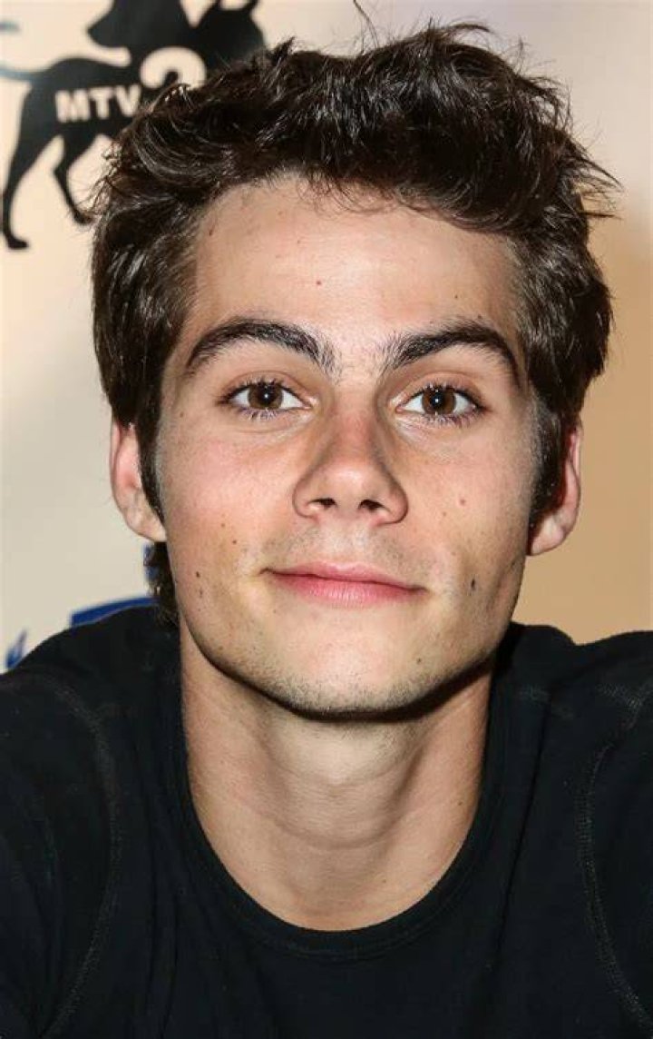 Dylan O'Brien as Stiles Stilinski and Tyler Posey as Scott McCall standing next to each other in Teen Wolf