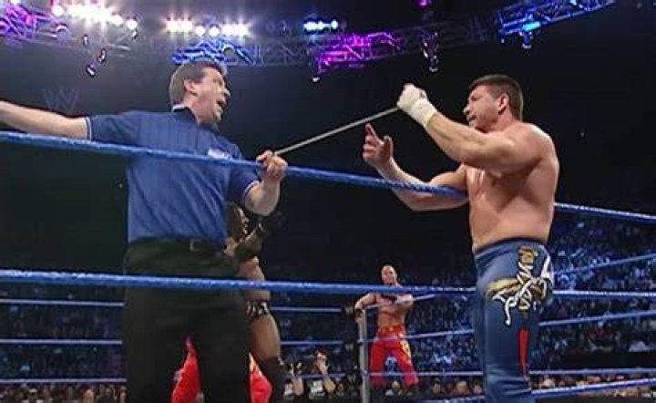 Eddie Guerrero extends the tag rope