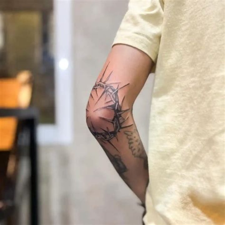 Elbow tattoo
