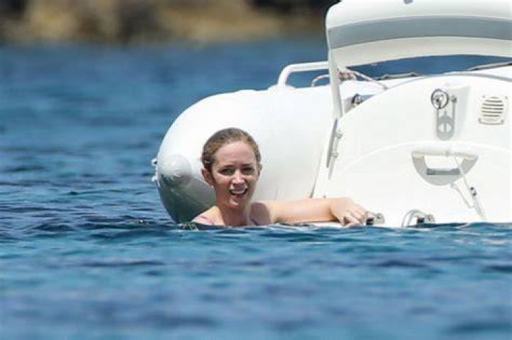Emily Blunt in Bikini on a Boat in Italy