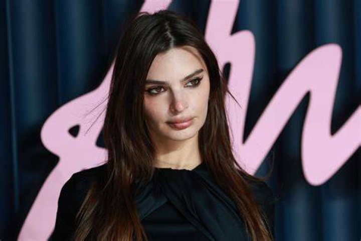 Emily Ratajkowski's Wears a Plunging Black Swimsuit in Miami