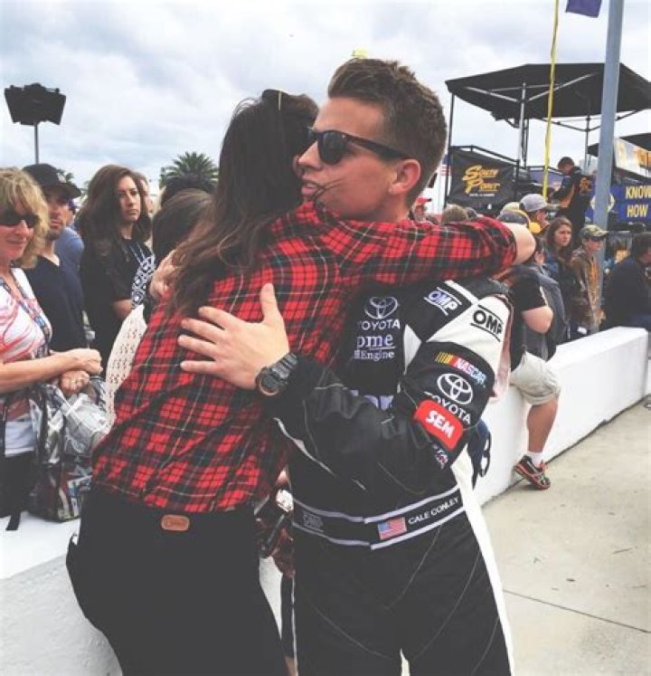Emma Blaney gives Cale Conley a hug before he gets in his car Conley