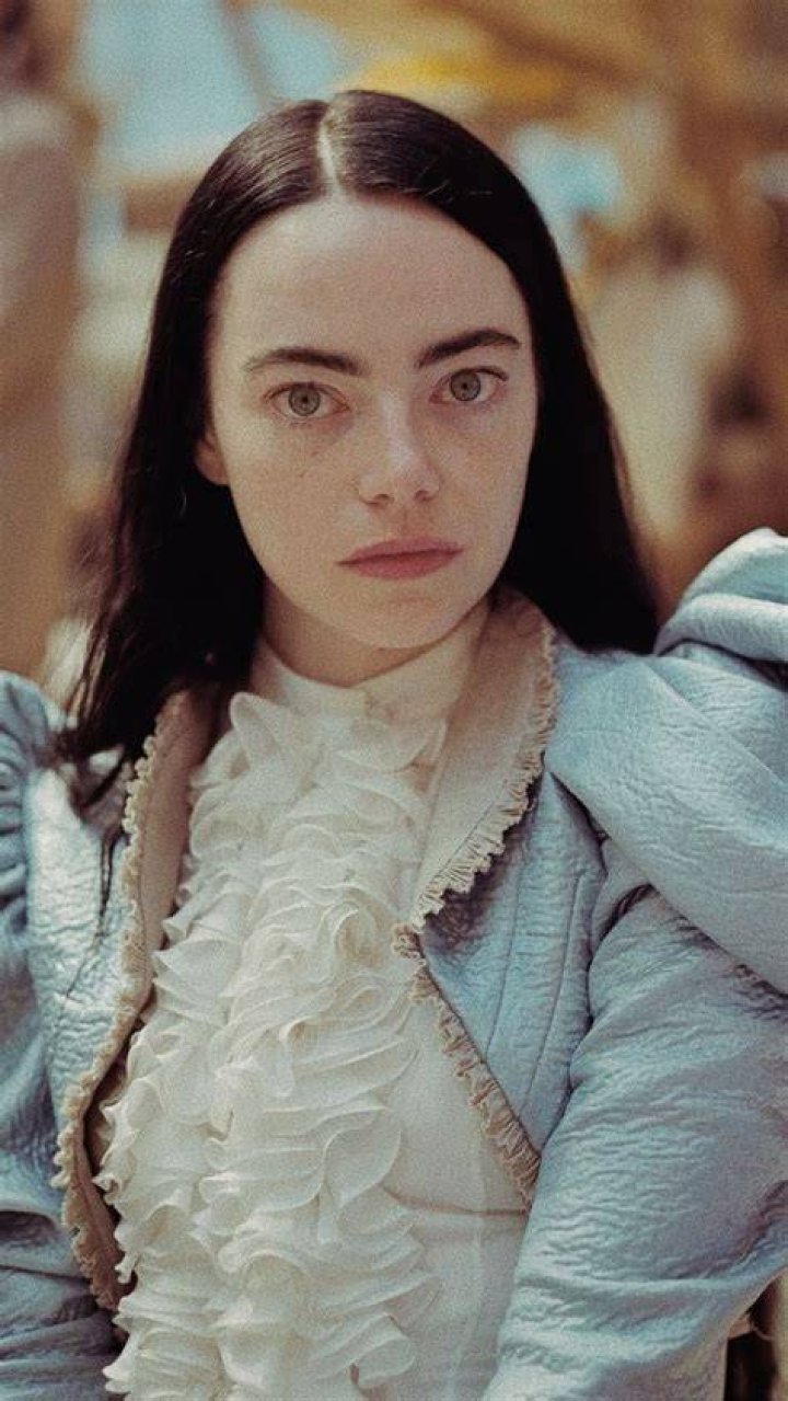 Emma Stone as Bella standing up in Poor Things