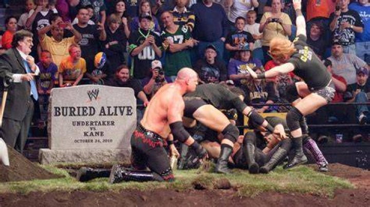 Every Buried Alive Match In WWE History, Ranked From Worst To Best Featured Image