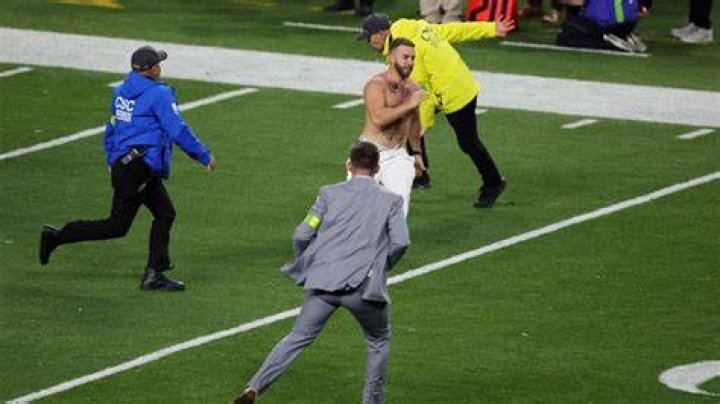 Fans Escorted Out of Stadium After Running Onto Field