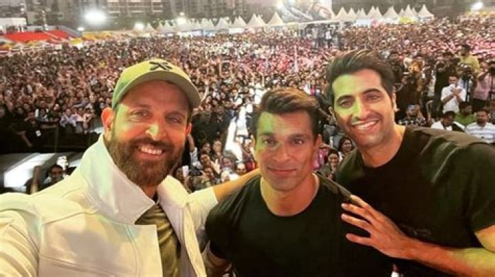 Fighter stars Hrithik Roshan, Karan Singh Grover and Akshay Oberoi pose for a selfie at an event