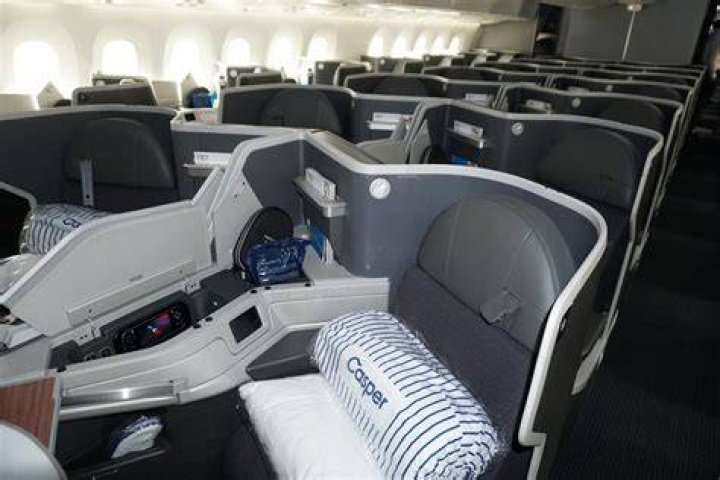 Flying Jail Cell? Business Class aboard an American Airlines Dreamliner. Photo / Grant Bradley
