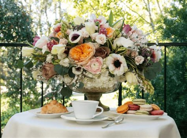French florist table; photo of the Sacre Coeur, Paris; Moroccan vase. Pictures / Supplied