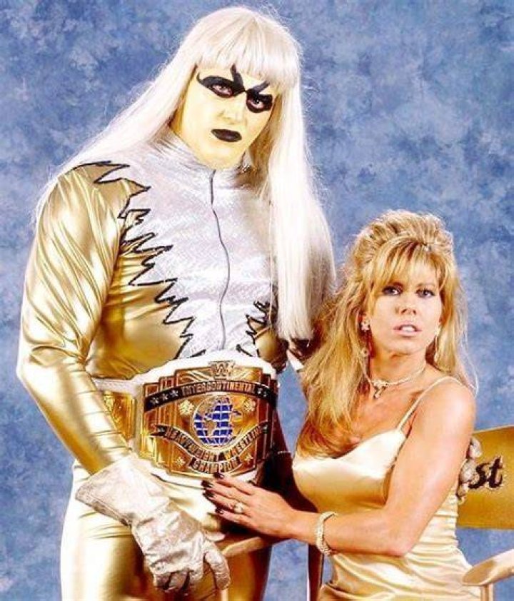 Goldust and Marlena in the corner of the ring.