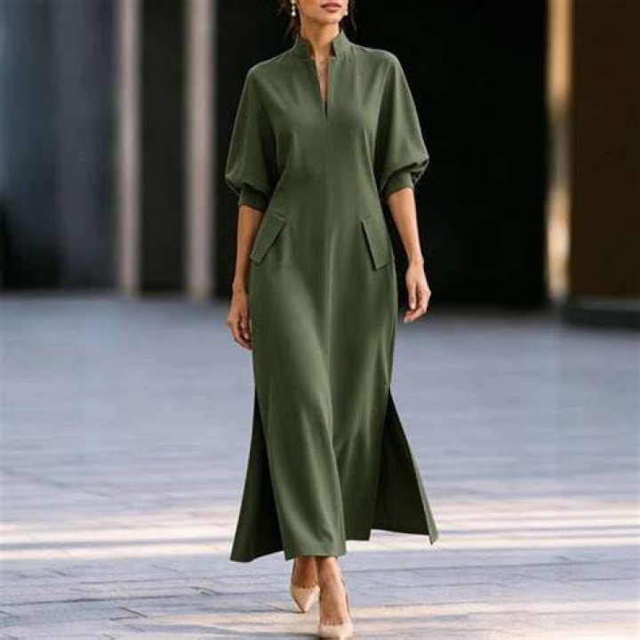 Green, Sleeve, Collar, Textile, Formal wear, Pattern, Fashion, Costume design, One-piece garment, Day dress, 