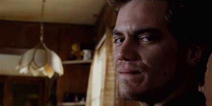 Greg smirking in 8 Mile