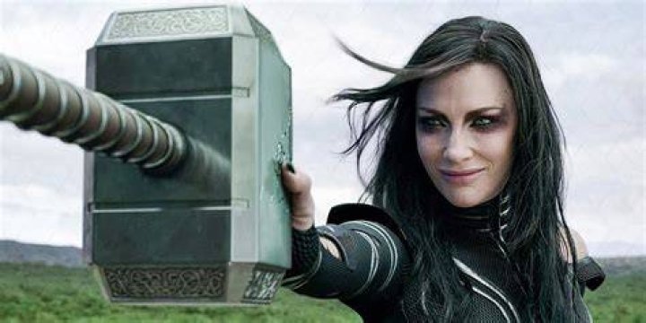 Hela catches Thor's hammer Mjolnir.
