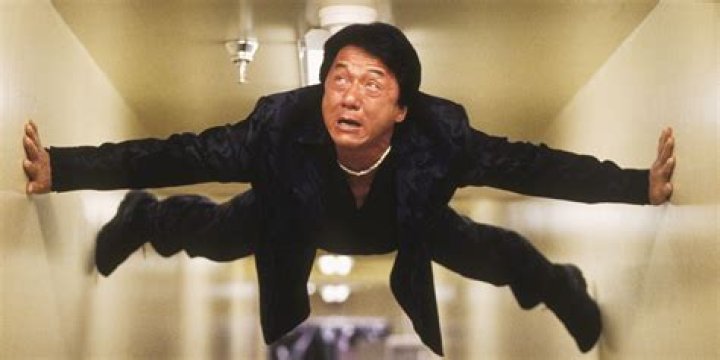 Jackie Chan walks through the woods in The Foreigner