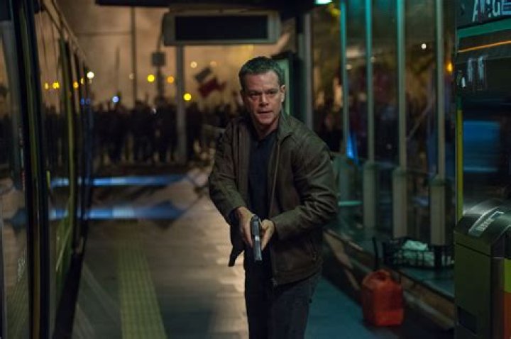 Jason Bourne speeding away from Paris police in The Bourne Identity
