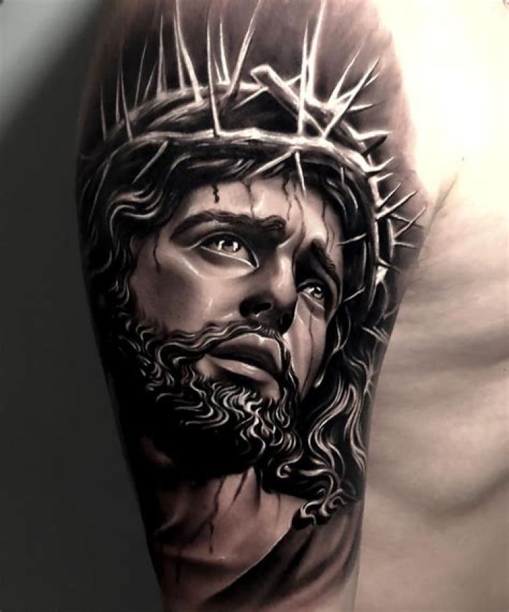 Jesus face tattoo