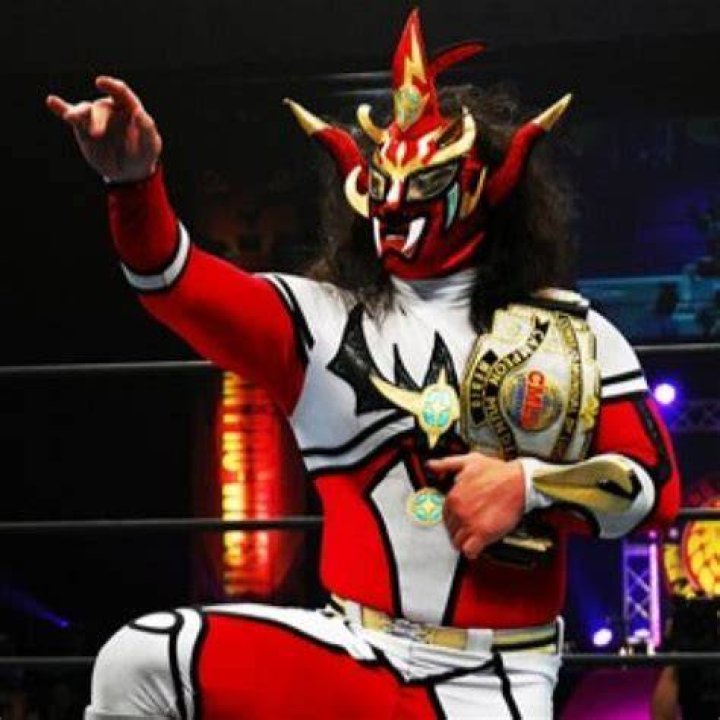 Jushin Thunder Liger with championship belts