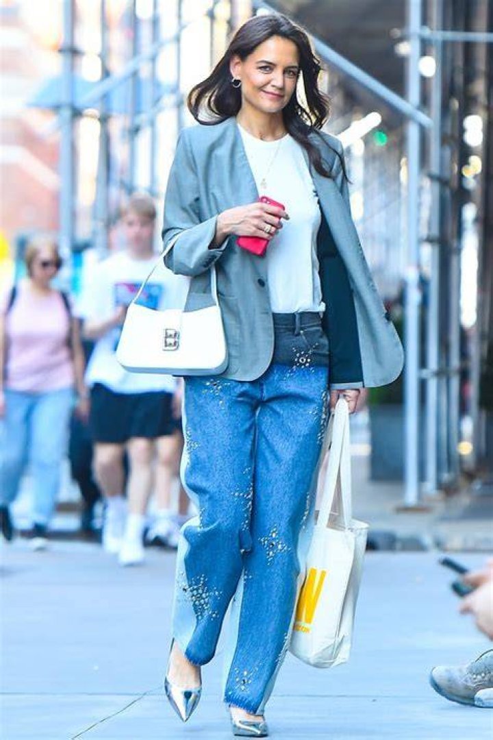 Katie Holmes wears embellished two tone jeans and blazer
