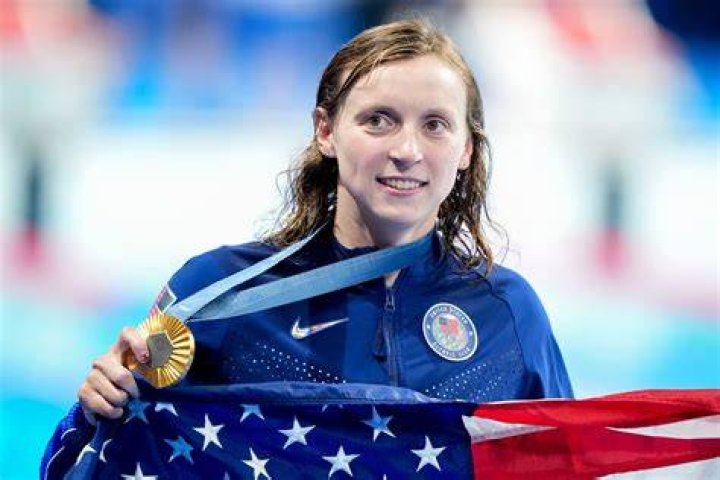 Katie Ladecky Aims For Silver in This Ribbed Sparkling Midi Dress and