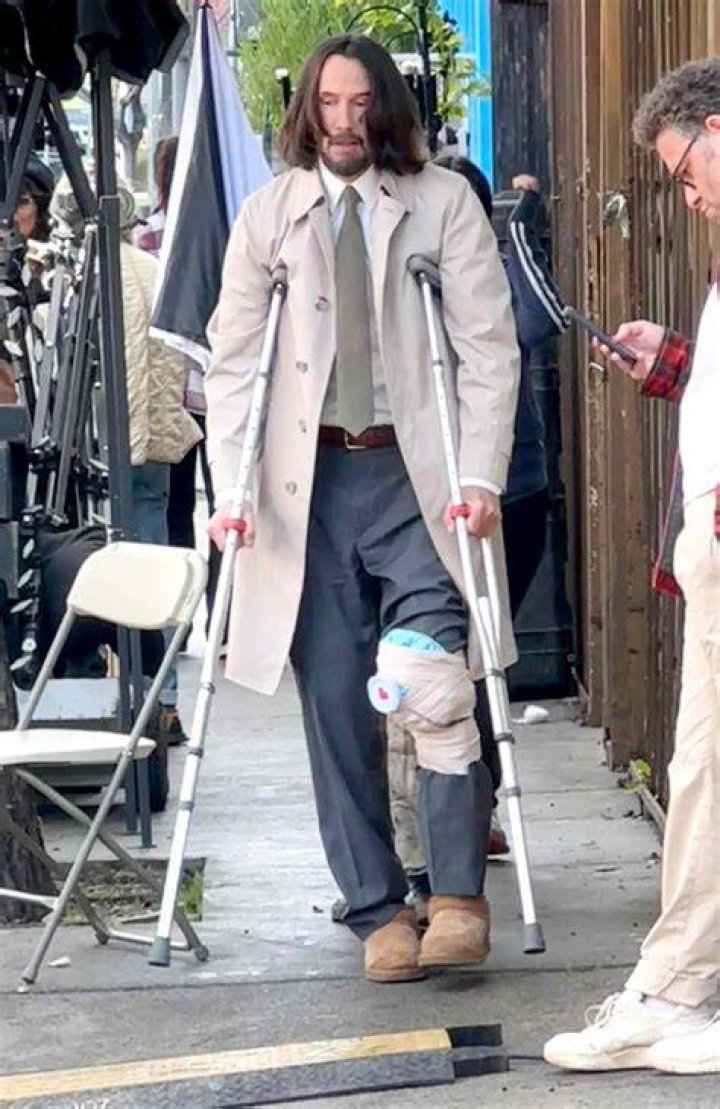 Keanu Reeves Seen with Crutches and Ice Pack While on Break from Filming