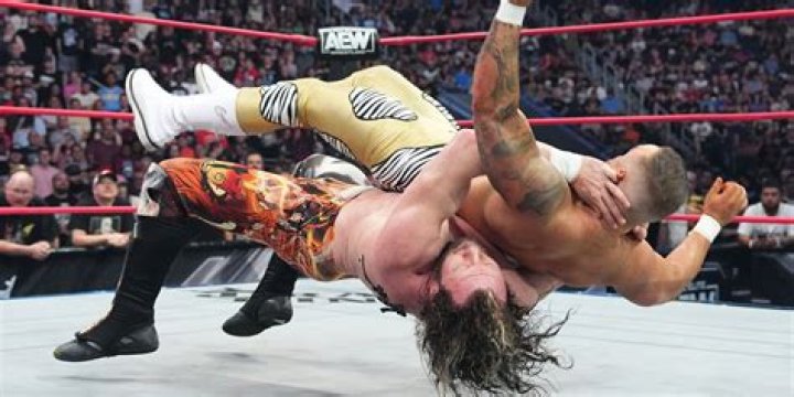 Kenny Omega dragon suplex Cropped