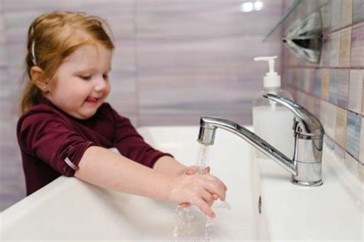Kids washing their hands
